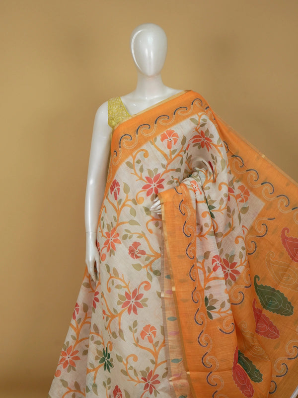 Cream linen cotton saree with orange floral print and paisley border