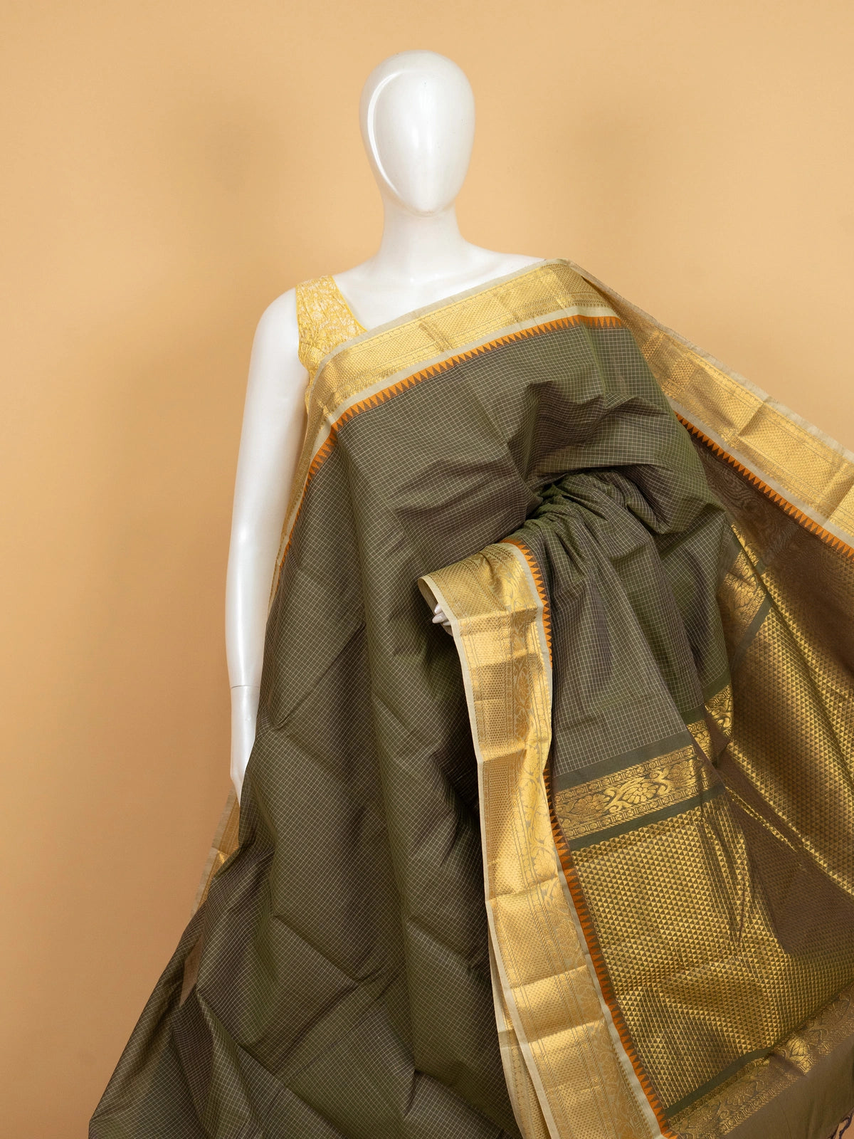 Olive green Chettinad cotton saree with checked body and gold zari border