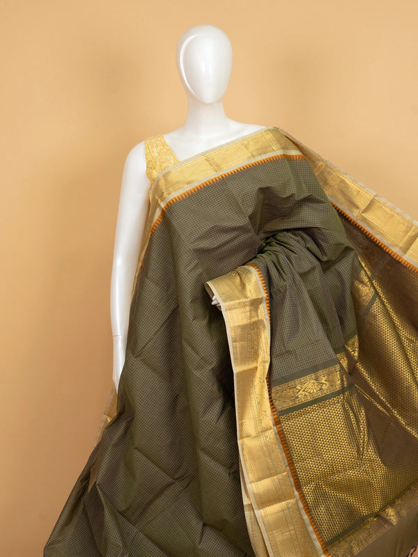 Olive green Chettinad cotton saree with checked body and gold zari border