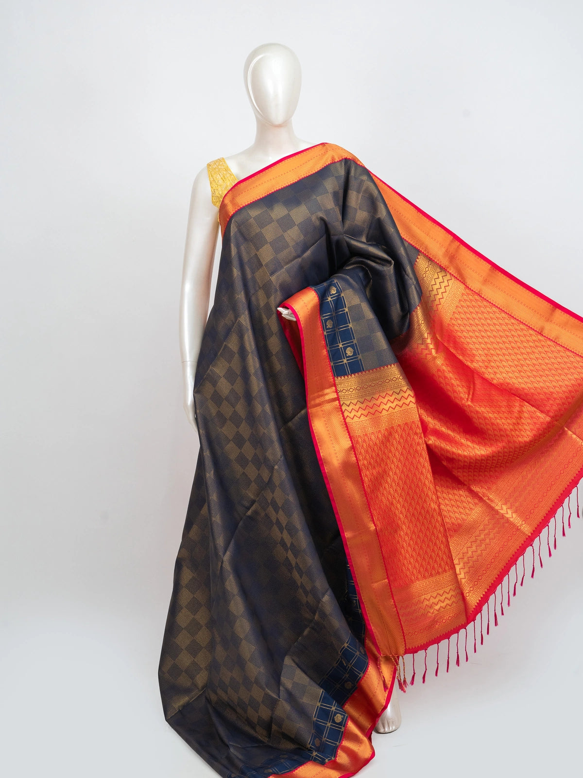 Navy blue Kanchipuram fancy silk saree with gold zari checks and contrast orange-red zari border and pallu