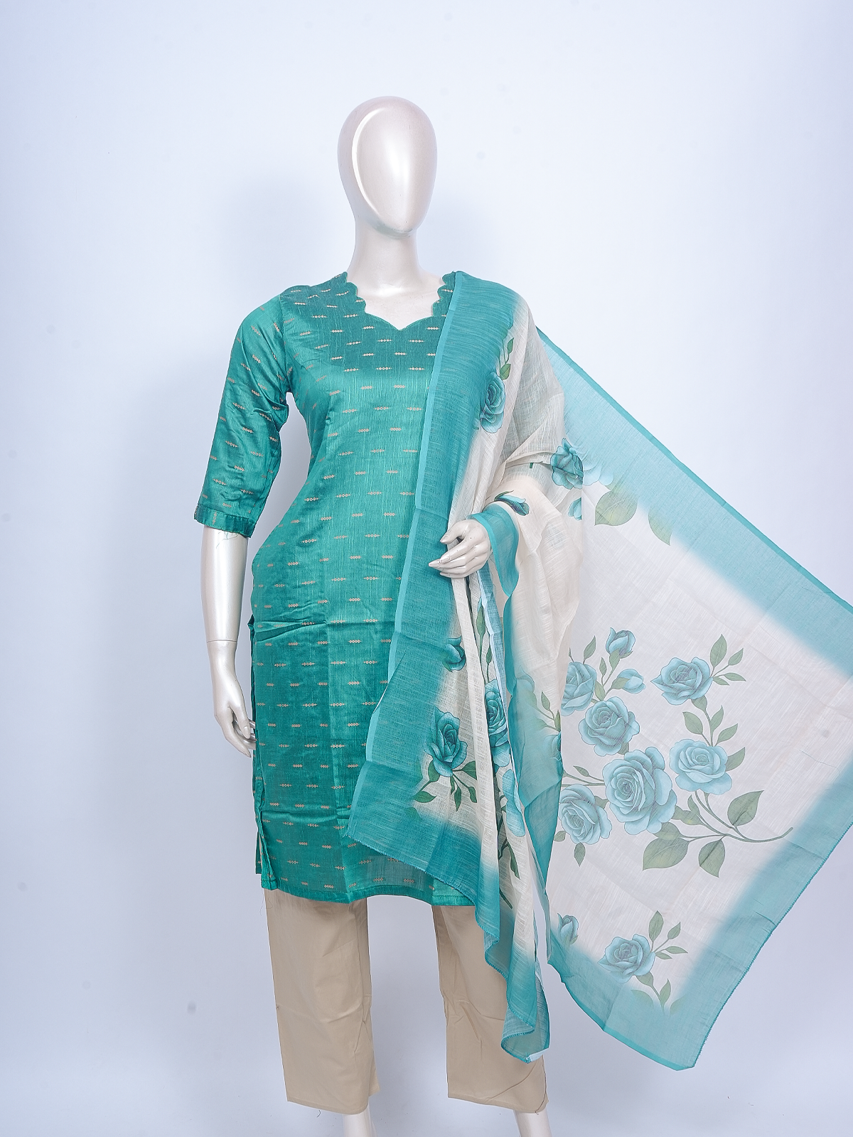 Teal green straight kurti set with woven motifs and off-white floral printed dupatta