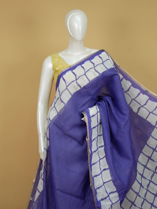 Violet linen cotton saree with white batik square-grid border and spiral motifs