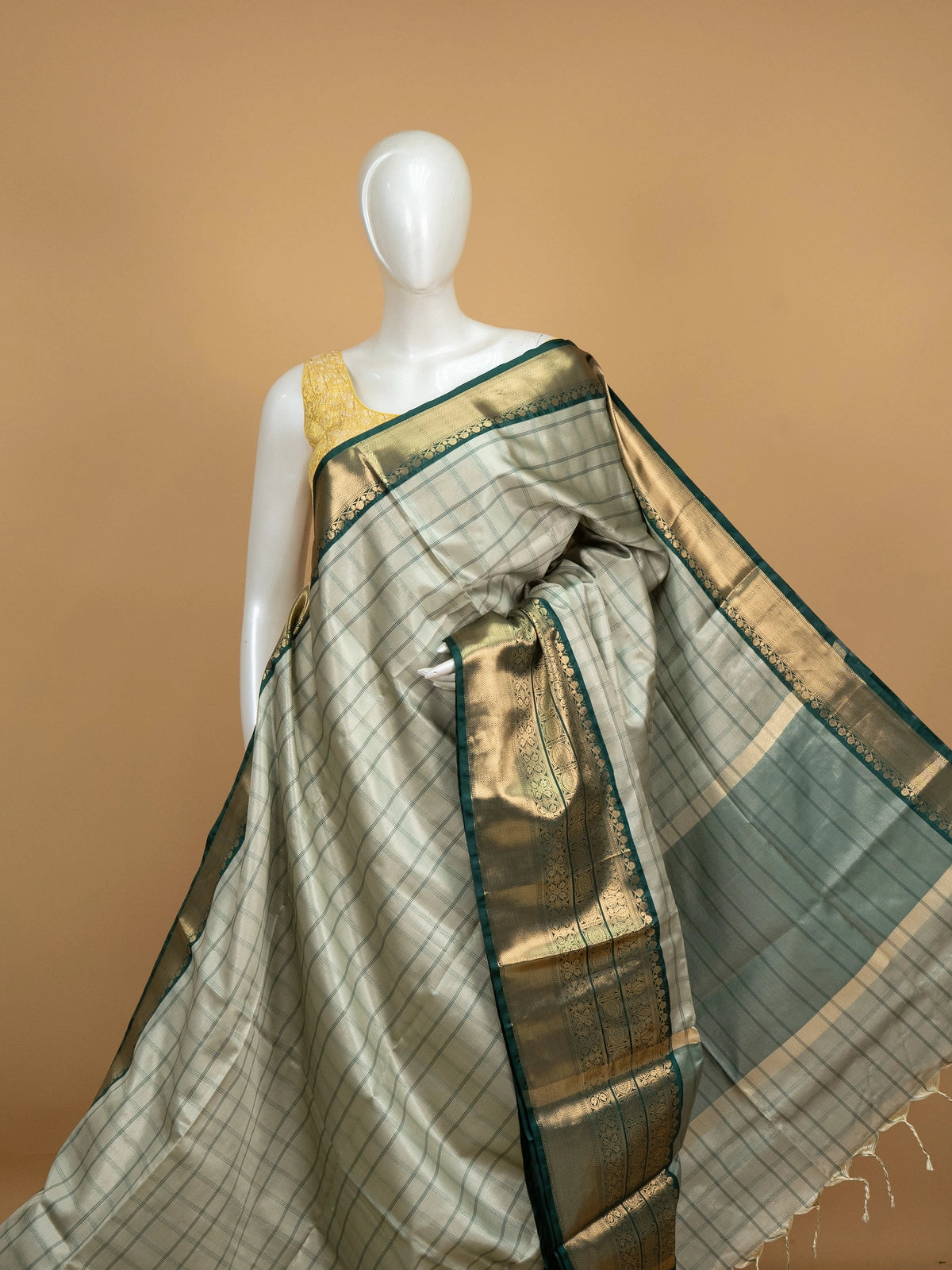 Grey and green checked Kanchi semi silk saree with green and gold zari border