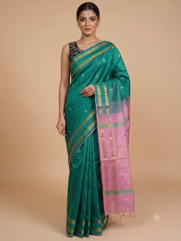 Green Banana Silk saree with contrast pink pallu and gold zari border