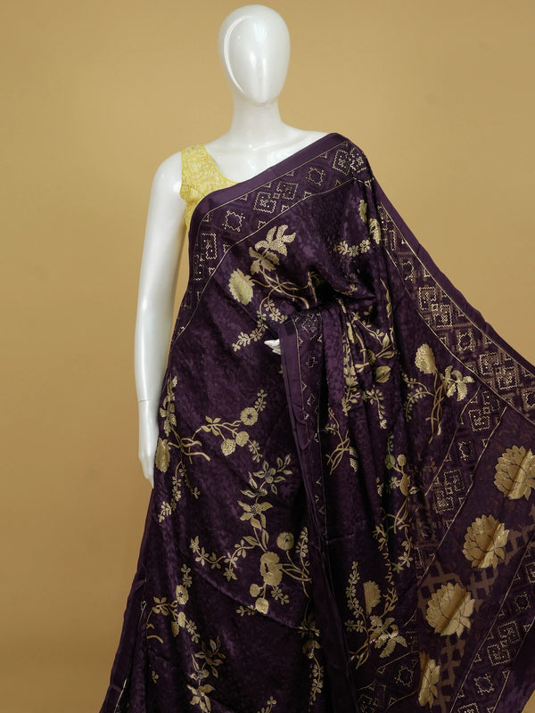 Purple and gold designer art silk saree with floral zari motifs, lotus pallu and contrast printed blouse
