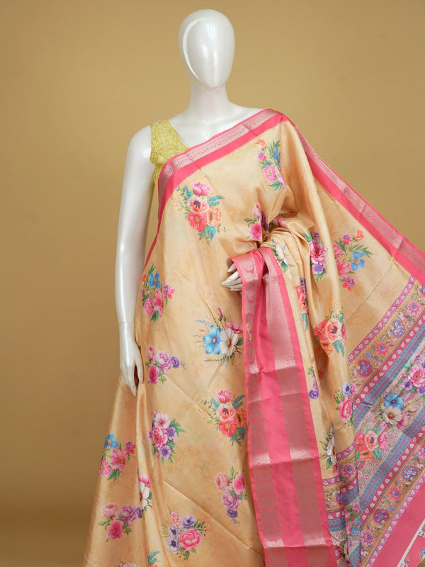 Cream Dola silk saree with multicolour floral print and contrast pink silver zari border