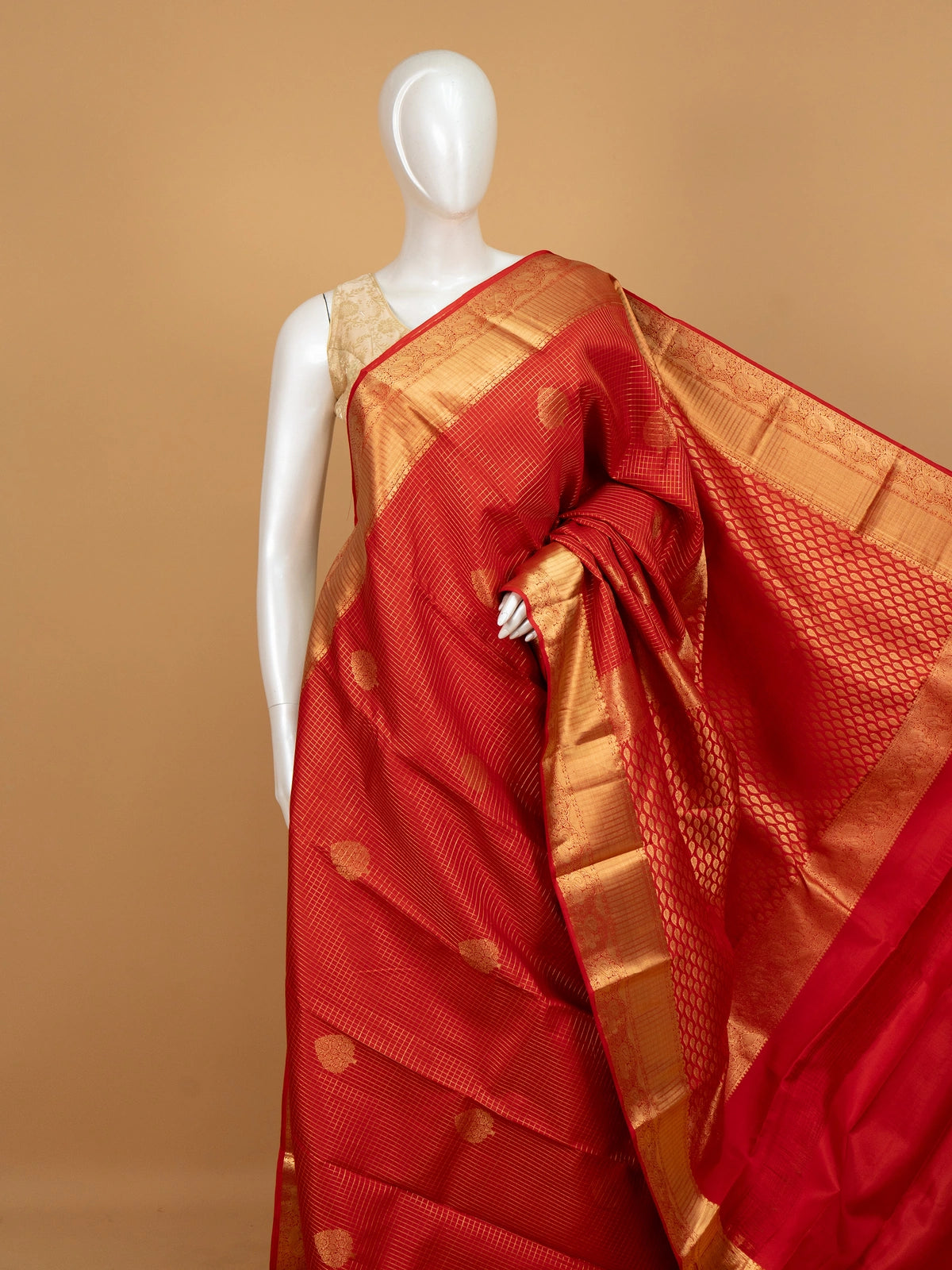 Red pure Kanchipuram silk saree with gold zari checks and contrast gold zari border