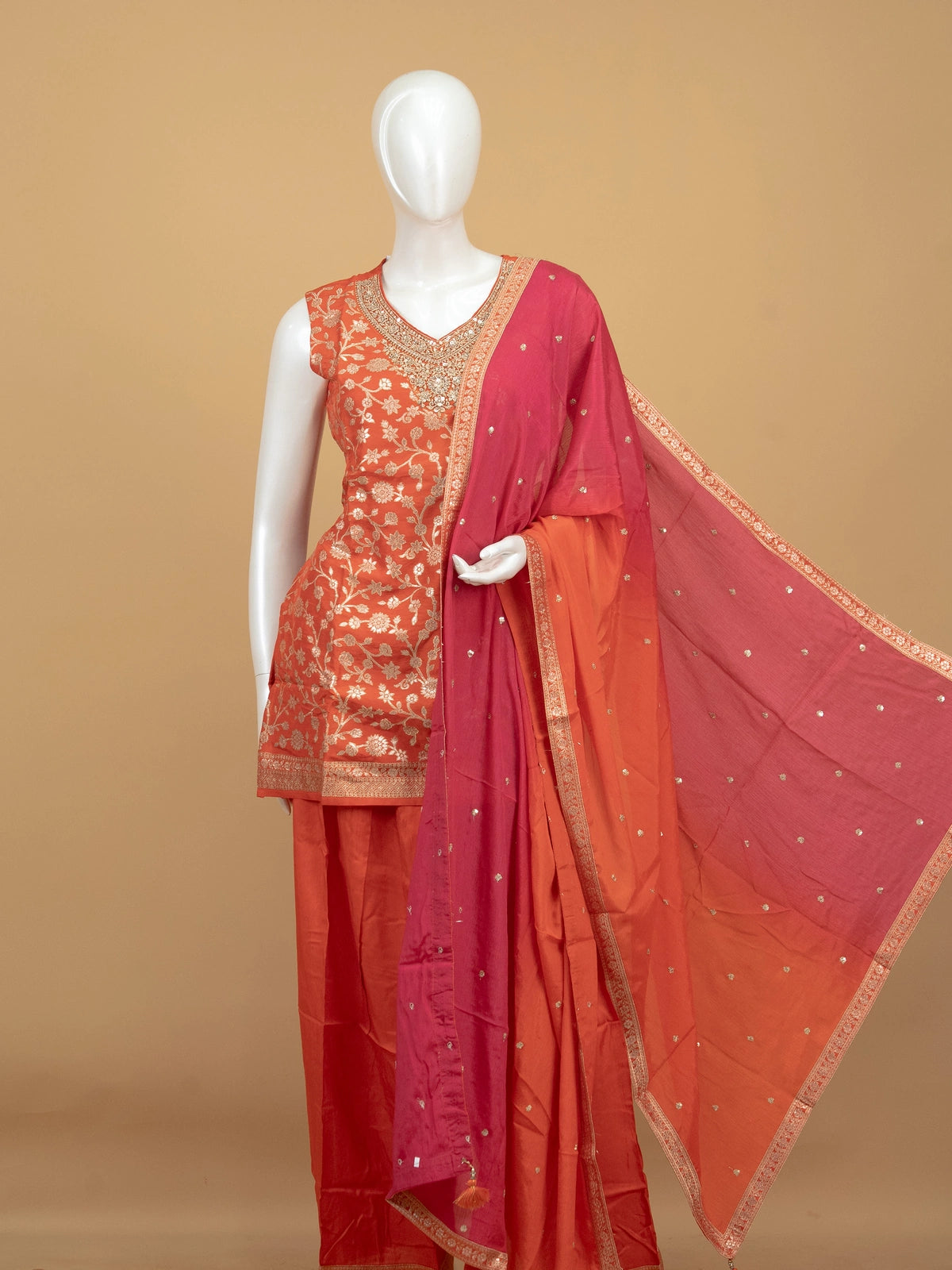 Orange floral zari silk embroidered straight cut kurti top with embellished neckline