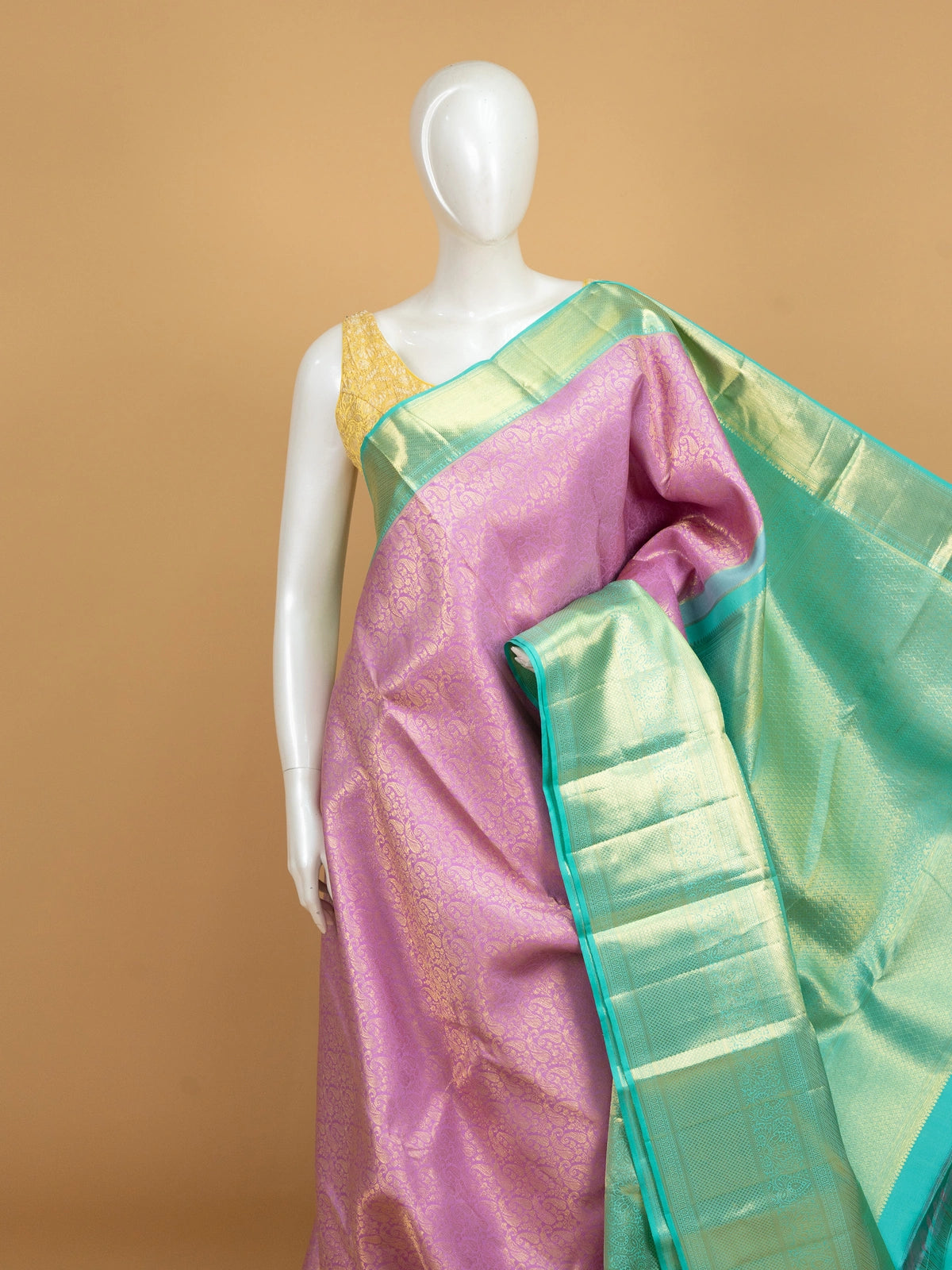 Pink and teal green pure Kanchipuram silk saree with allover gold zari brocade and contrast border