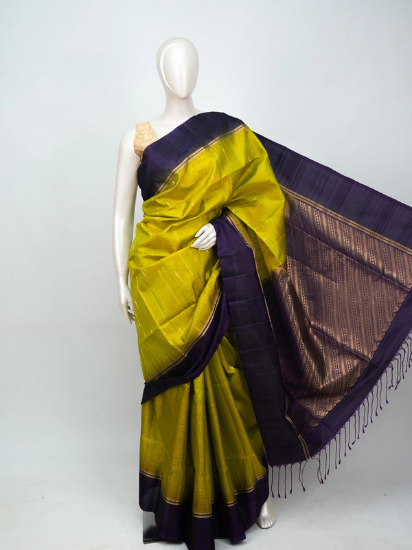 Lime green soft silk saree with purple contrast border and gold zari pallu