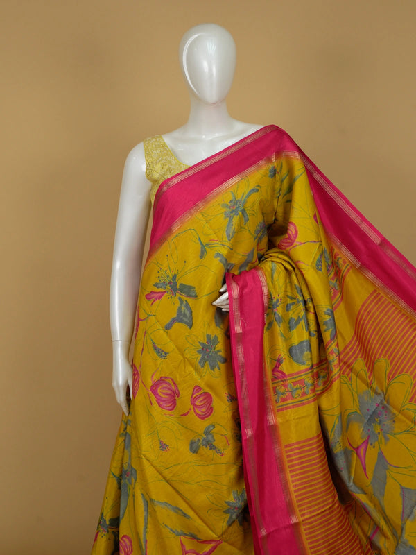 Mustard yellow Dola silk saree with pink zari border and floral print pallu