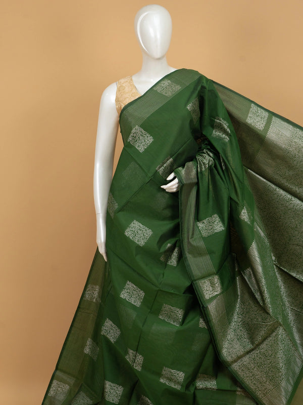 Green silk cotton saree with silver zari square buttas and temple-triangle border