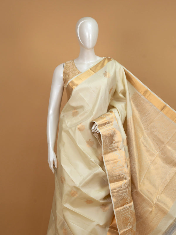 Cream Pure Kanchipuram silk saree with gold zari swan motifs and broad zari border