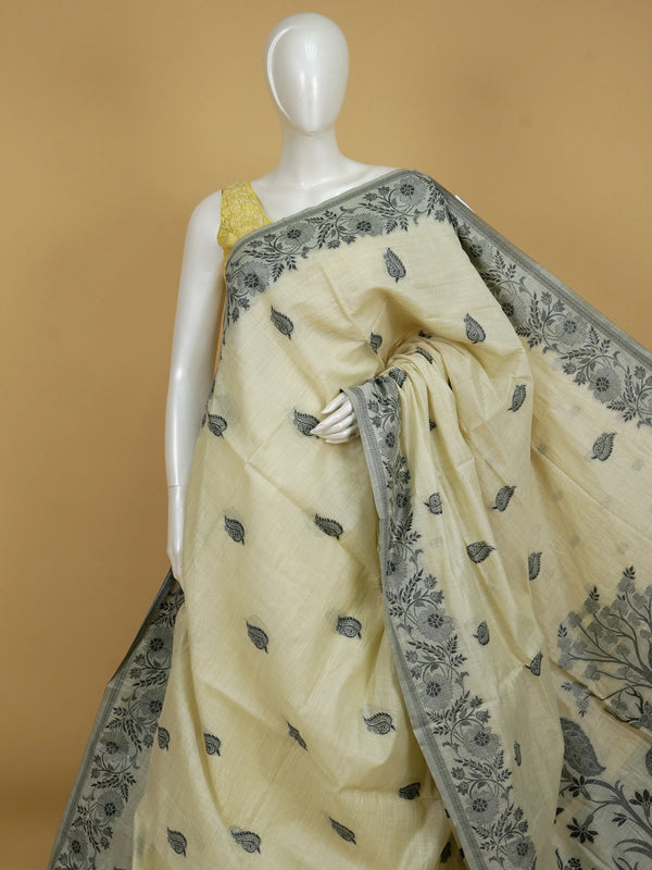 Cream linen cotton saree with grey floral border and peacock-deer motif pallu