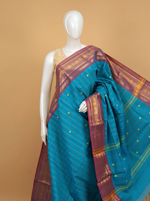 Peacock blue Chettinad cotton saree with checked body, yellow buttas and magenta gold zari border