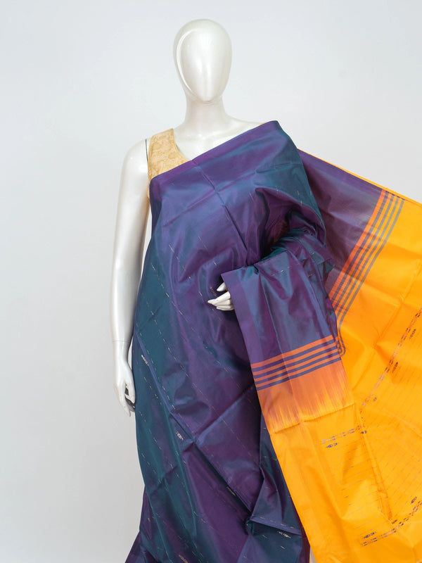 Teal and purple banana silk saree with gold zari stripes and a contrast mustard striped pallu