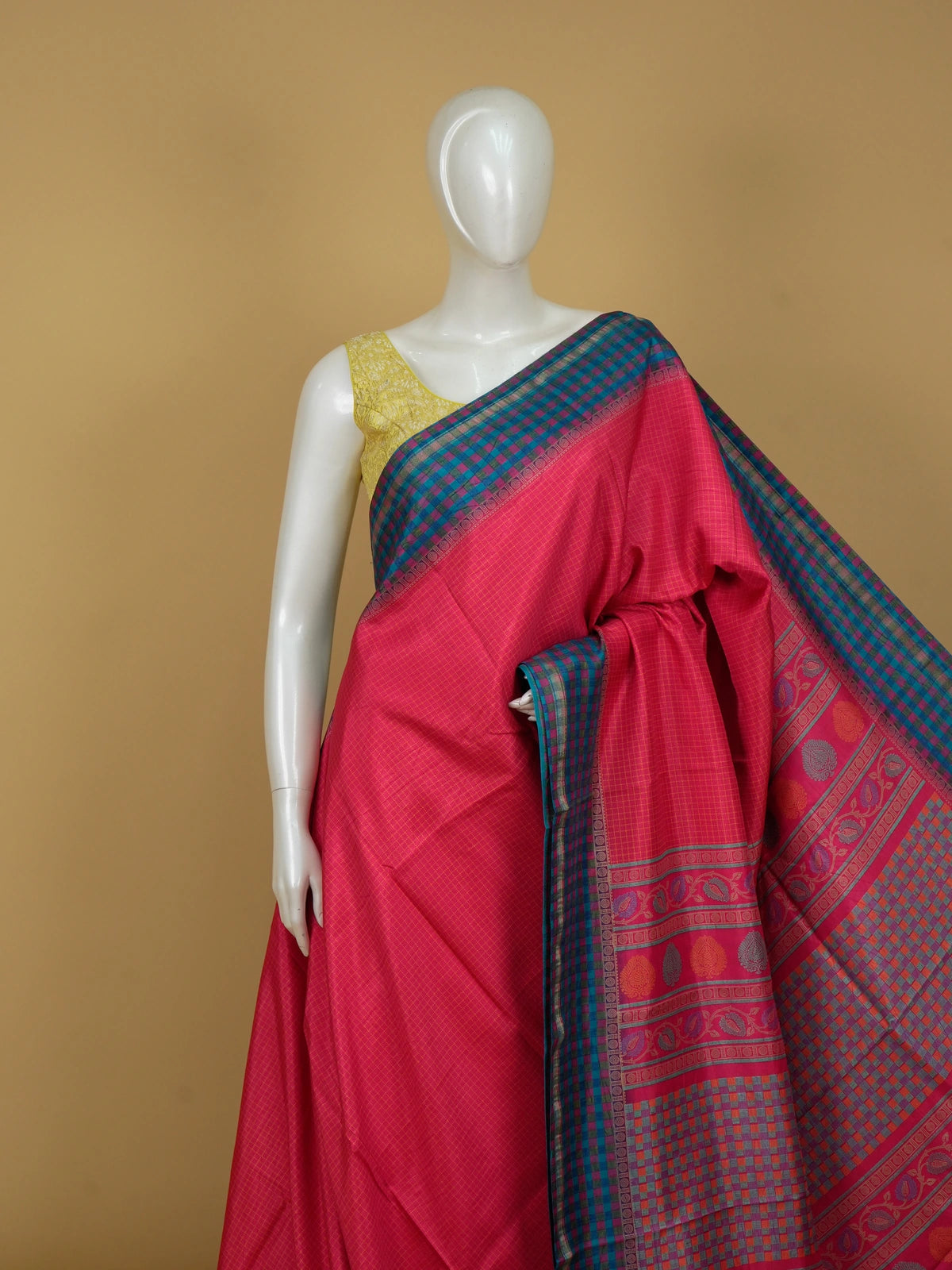 Magenta pink Dola silk saree with yellow checks, teal blue contrast checked border and paisley pallu