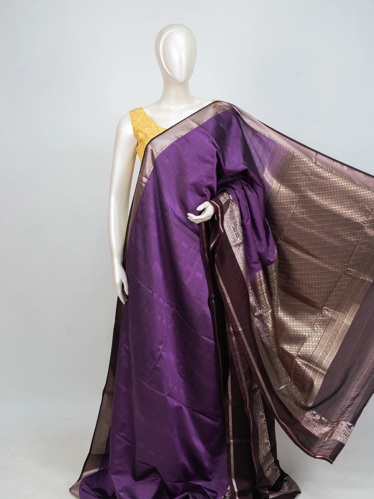 Purple semi silk saree with contrast wine border and copper-gold zari pallu