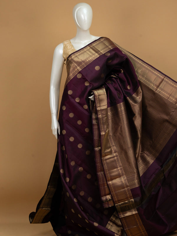 Deep purple pure Kanchipuram silk saree with gold zari circular buttas and contrast gold zari border