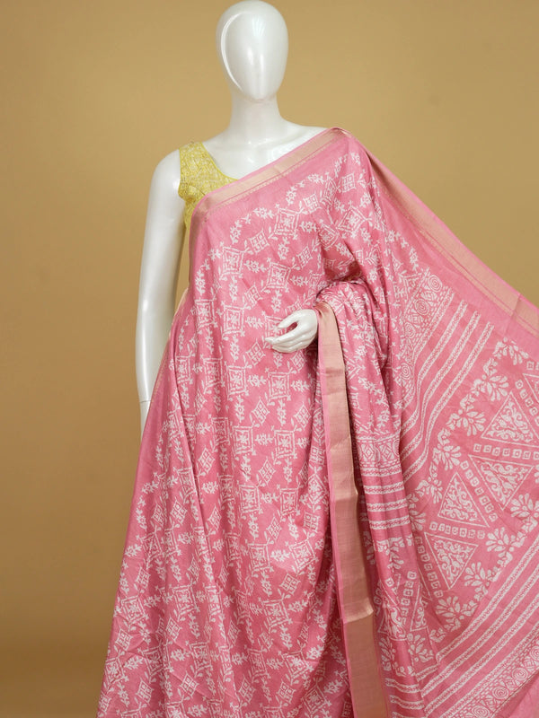 Pink and white batik-print designer cotton saree with gold zari border