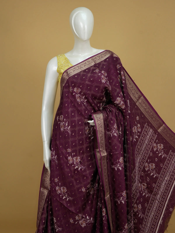 Wine purple art silk designer saree with floral prints, gold zari buttis and contrast zari border