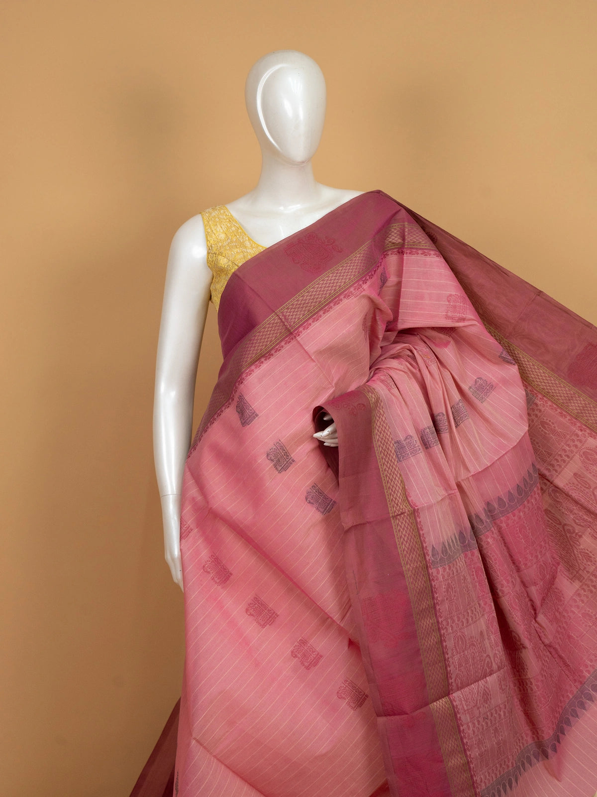 Pink semi raw silk saree with contrast rose border, gold zari and woven pallu motifs