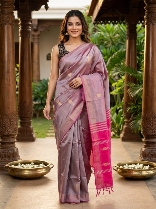 Dusty mauve banana silk saree with contrast pink zari pallu and black embroidered blouse