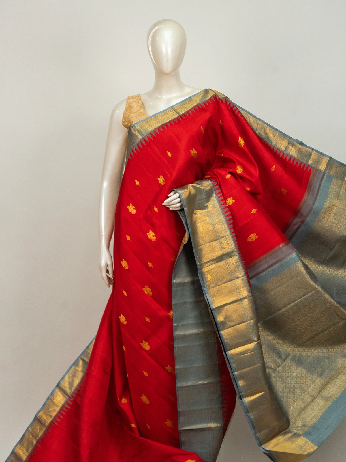 Red pure Kanchipuram silk saree with contrast grey gold zari temple border and woven buttas