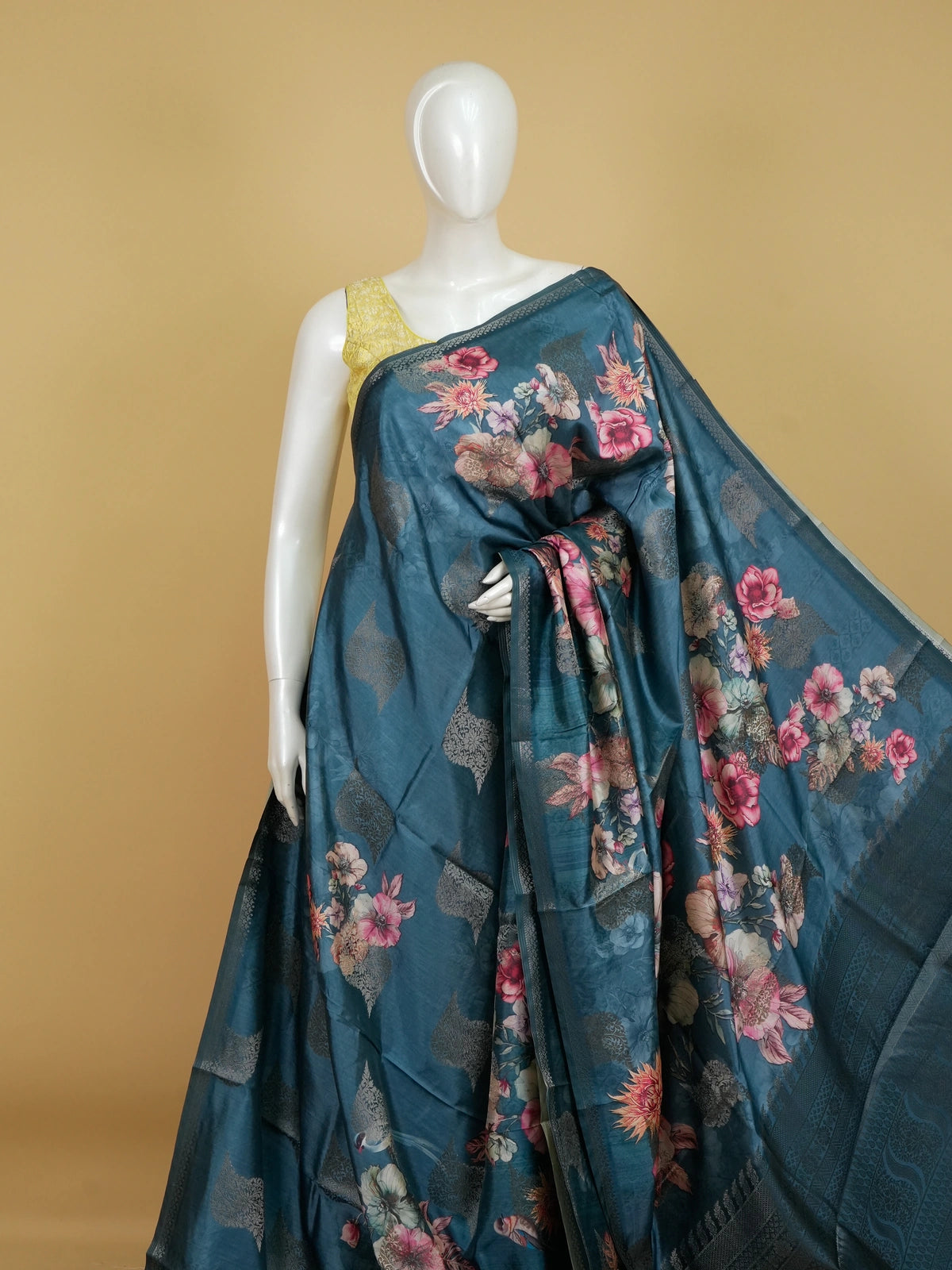 Teal blue semi tussar saree with multicolour floral print and silver zari border