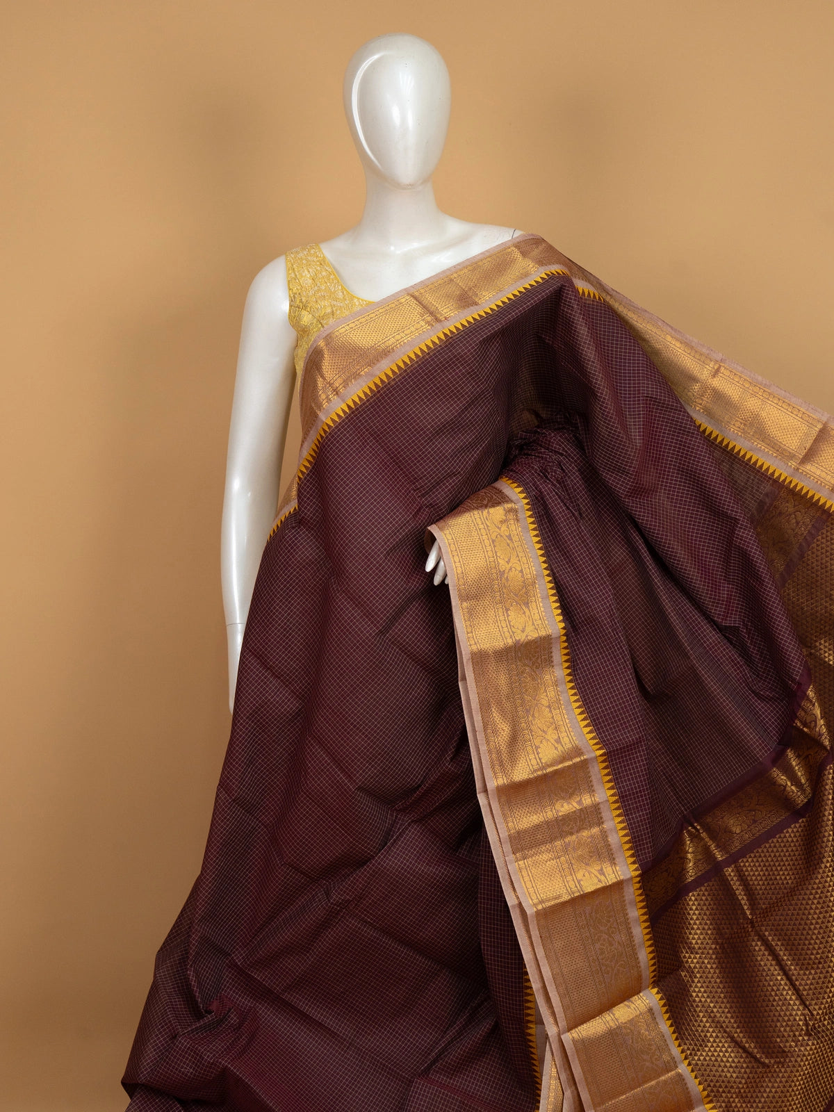 Maroon Chettinad cotton saree with gold zari temple border and contrast yellow blouse