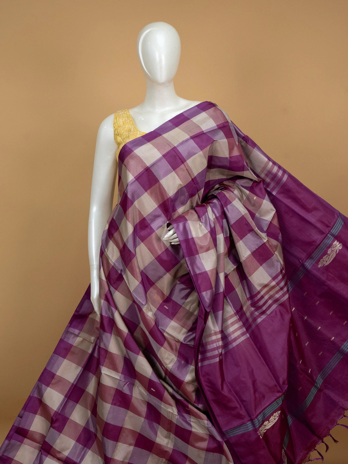 Magenta and cream checked banana silk saree with gold zari border and butta pallu