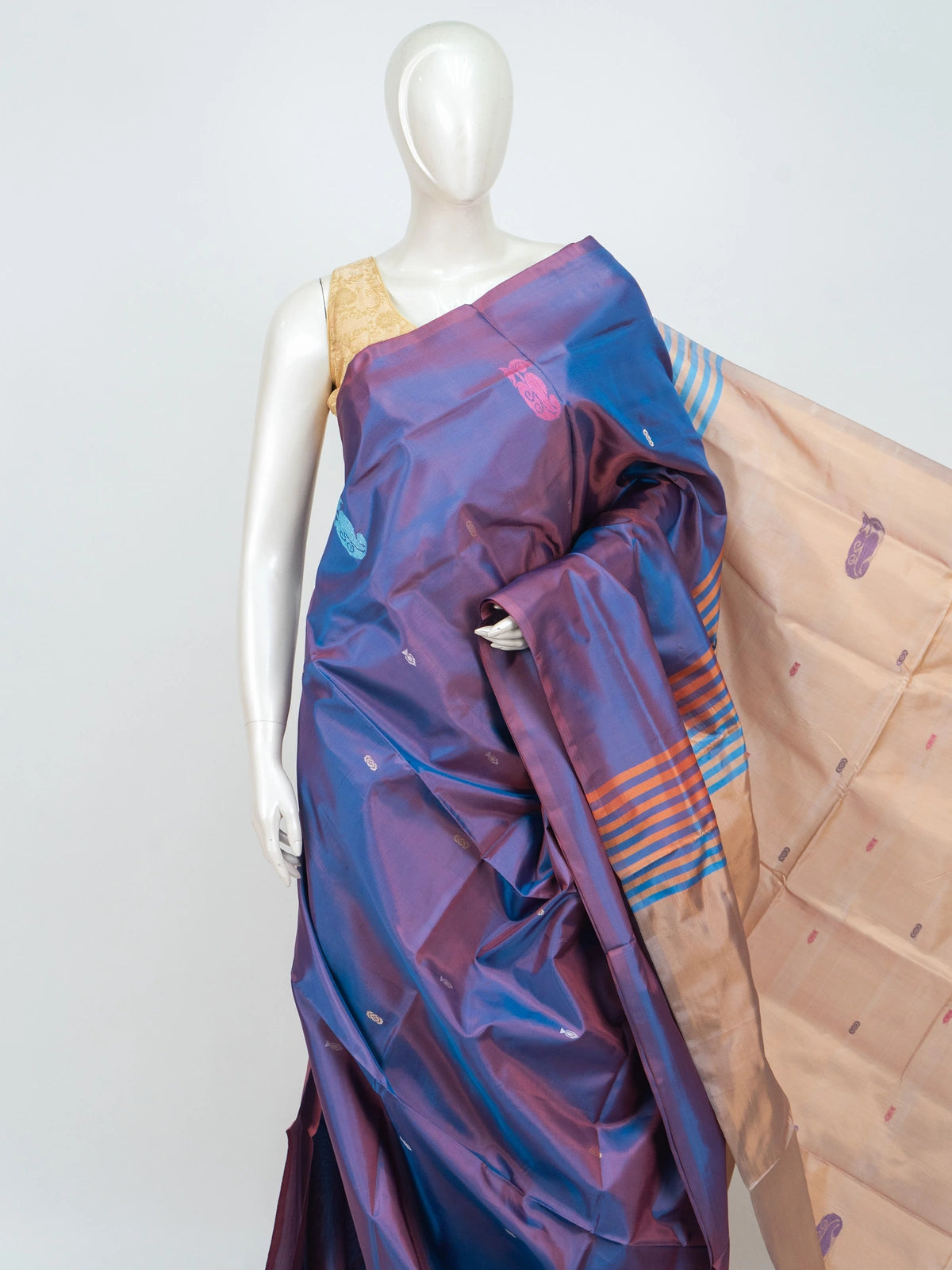 Blue and purple iridescent banana silk saree with woven buttas and contrast striped peach pallu