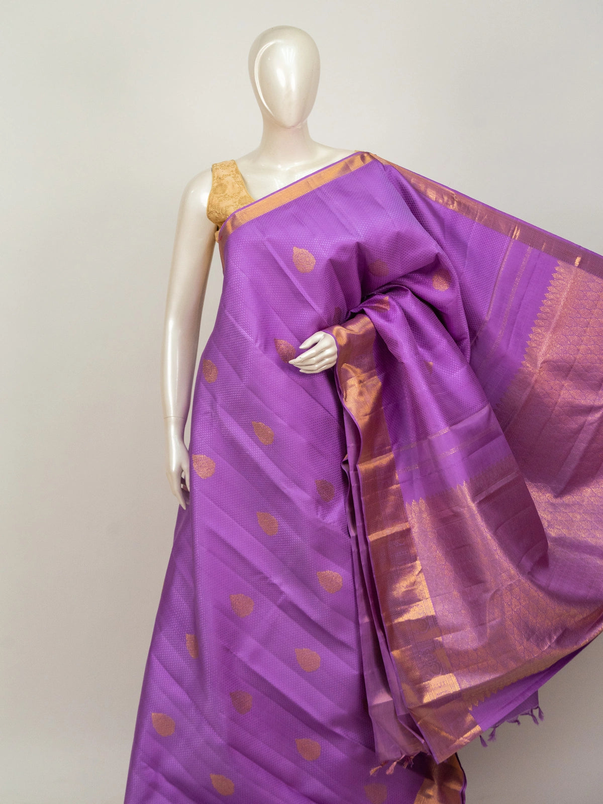Purple pure Kanchipuram silk saree with gold zari border, buta motifs and zari pallu
