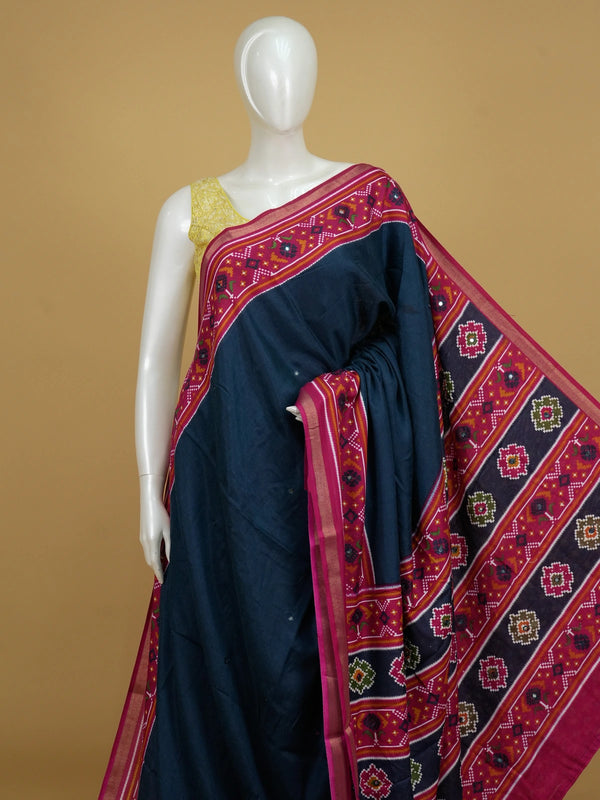 Navy blue linen cotton saree with contrast magenta Patola-style ikat border and pallu