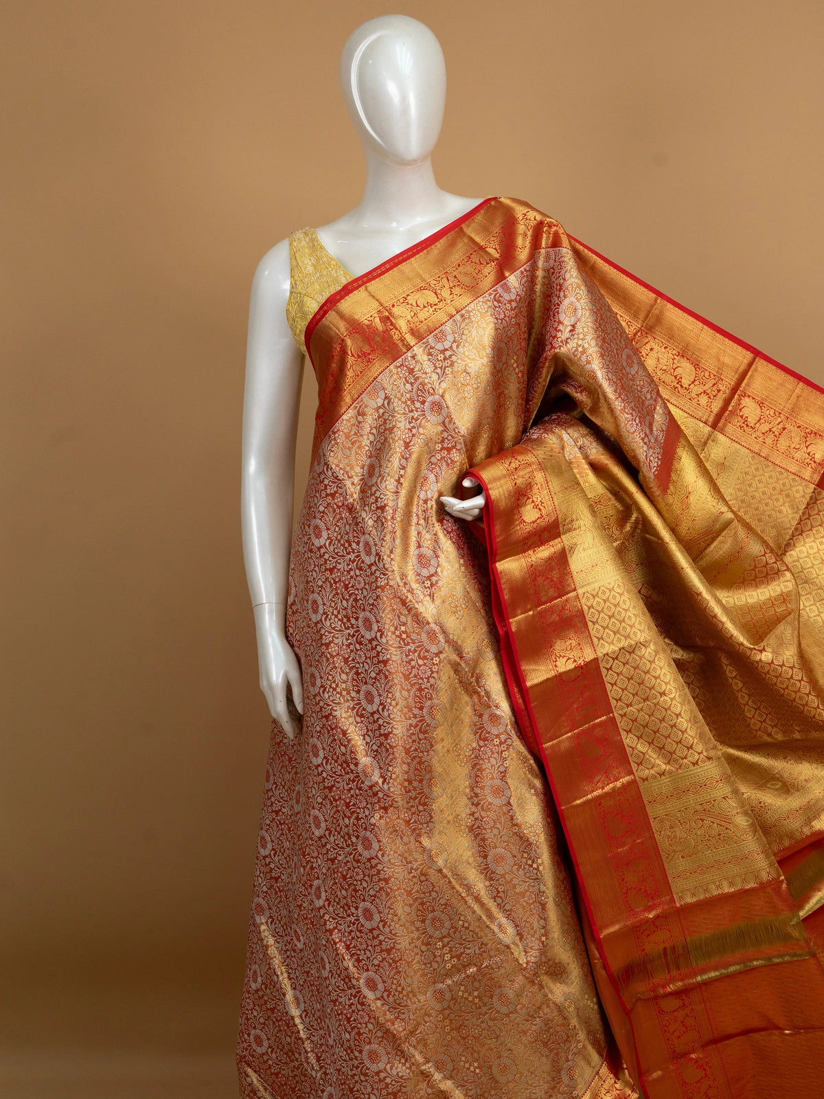 Golden orange and red pure Kanchipuram silk saree with gold zari floral brocade and contrast red peacock border
