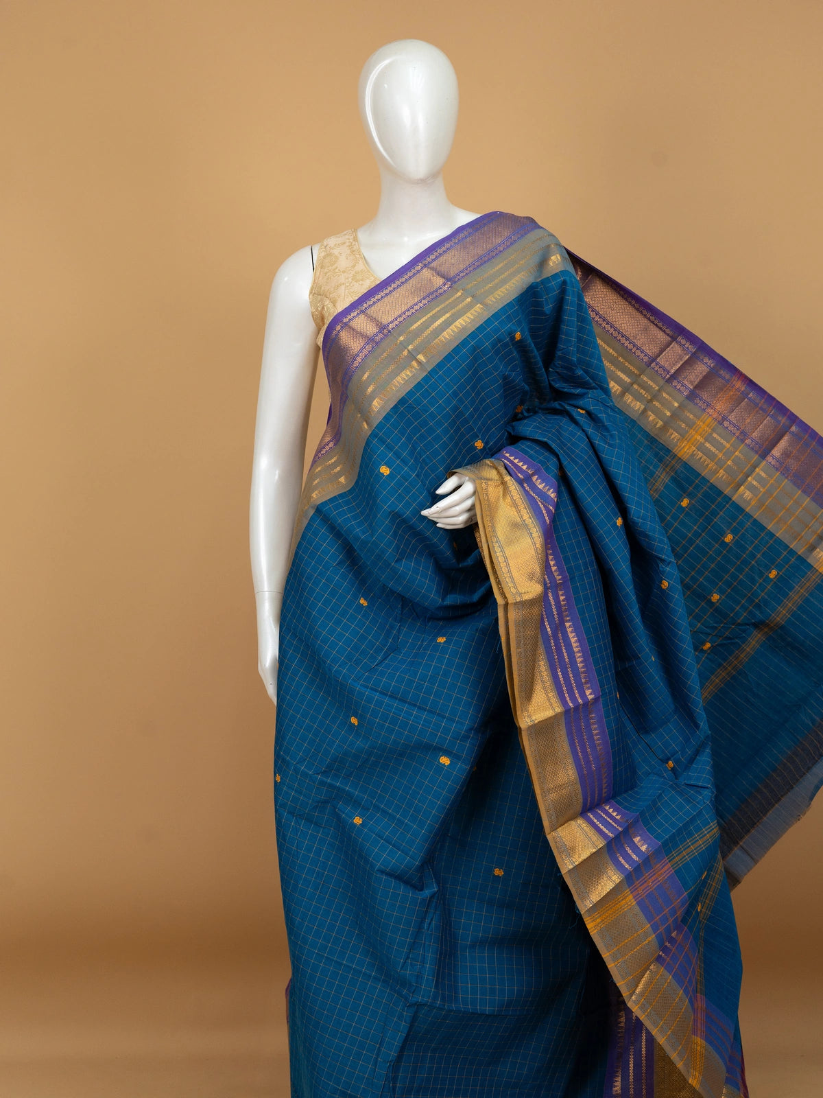 Peacock blue Chettinad cotton saree with gold checks, mustard butta motifs and contrast purple gold zari border