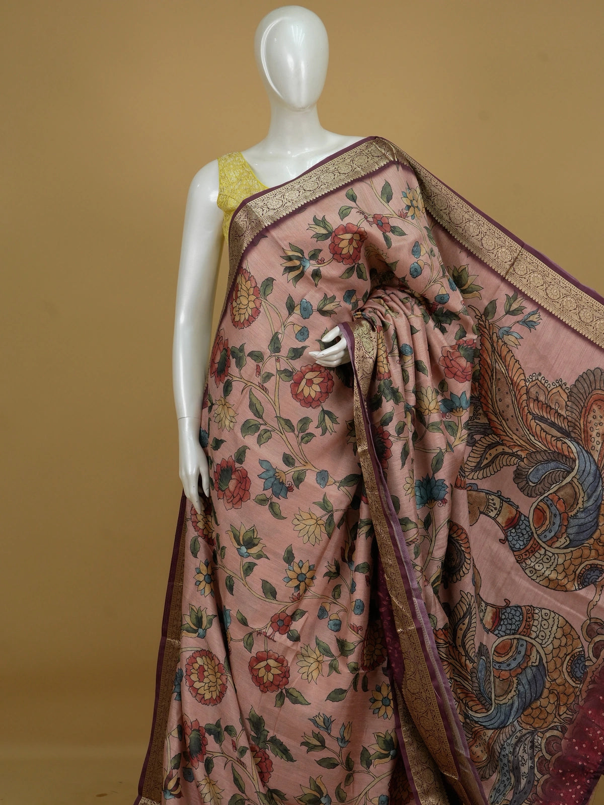 Dusty rose semi tussar saree with Kalamkari floral print, peacock pallu and maroon gold zari border