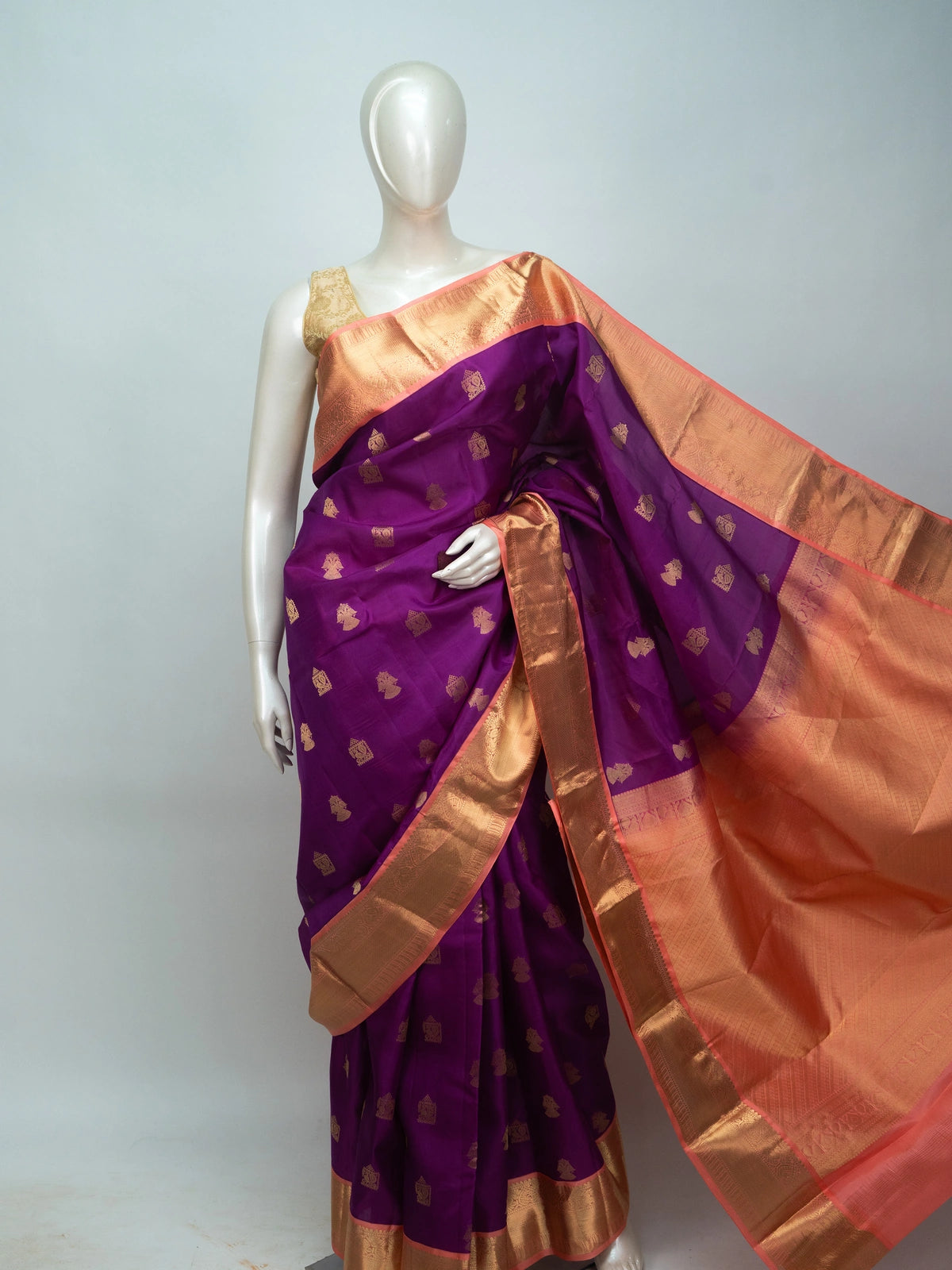 Purple pure Kanchipuram silk saree with contrast peach gold zari border and buttas