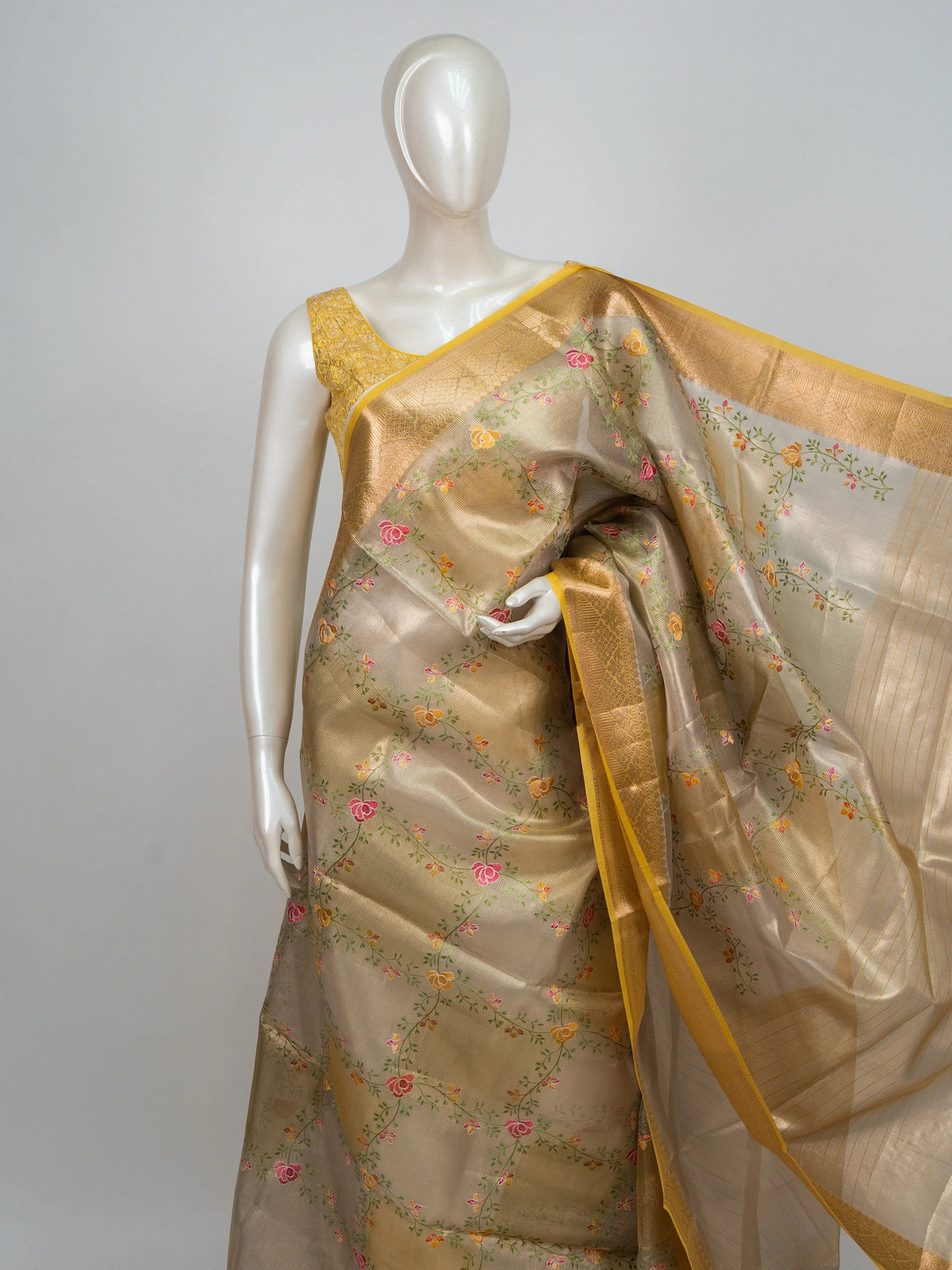 Golden beige semi raw silk saree with multicolour floral embroidery and gold zari border