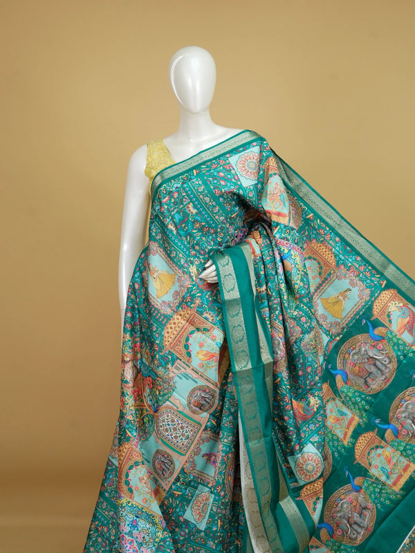 Teal green Dola silk saree with peacock and elephant patchwork print and gold zari border