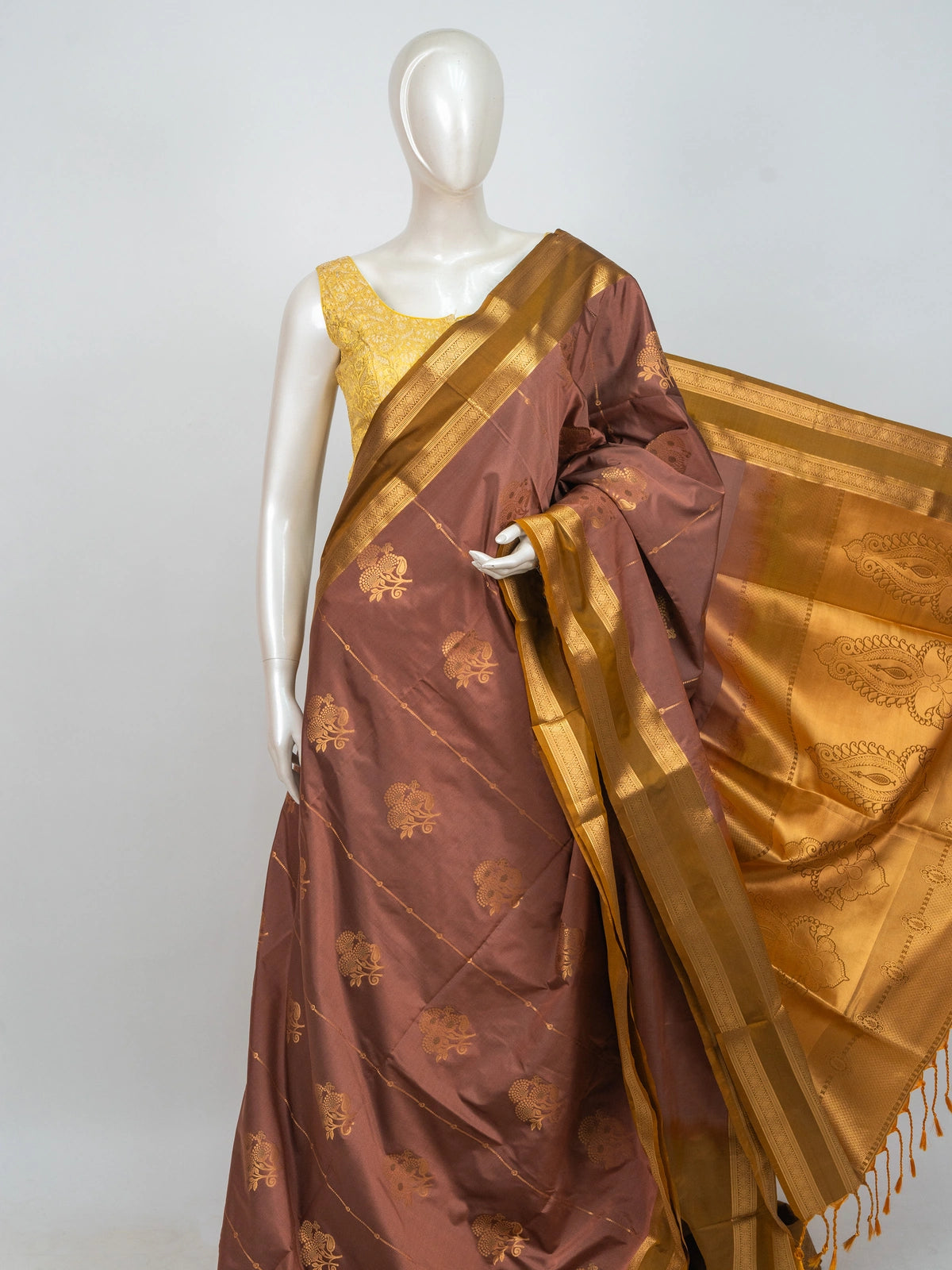 Dusty rose-brown semi silk saree with mustard-gold zari border and paisley pallu