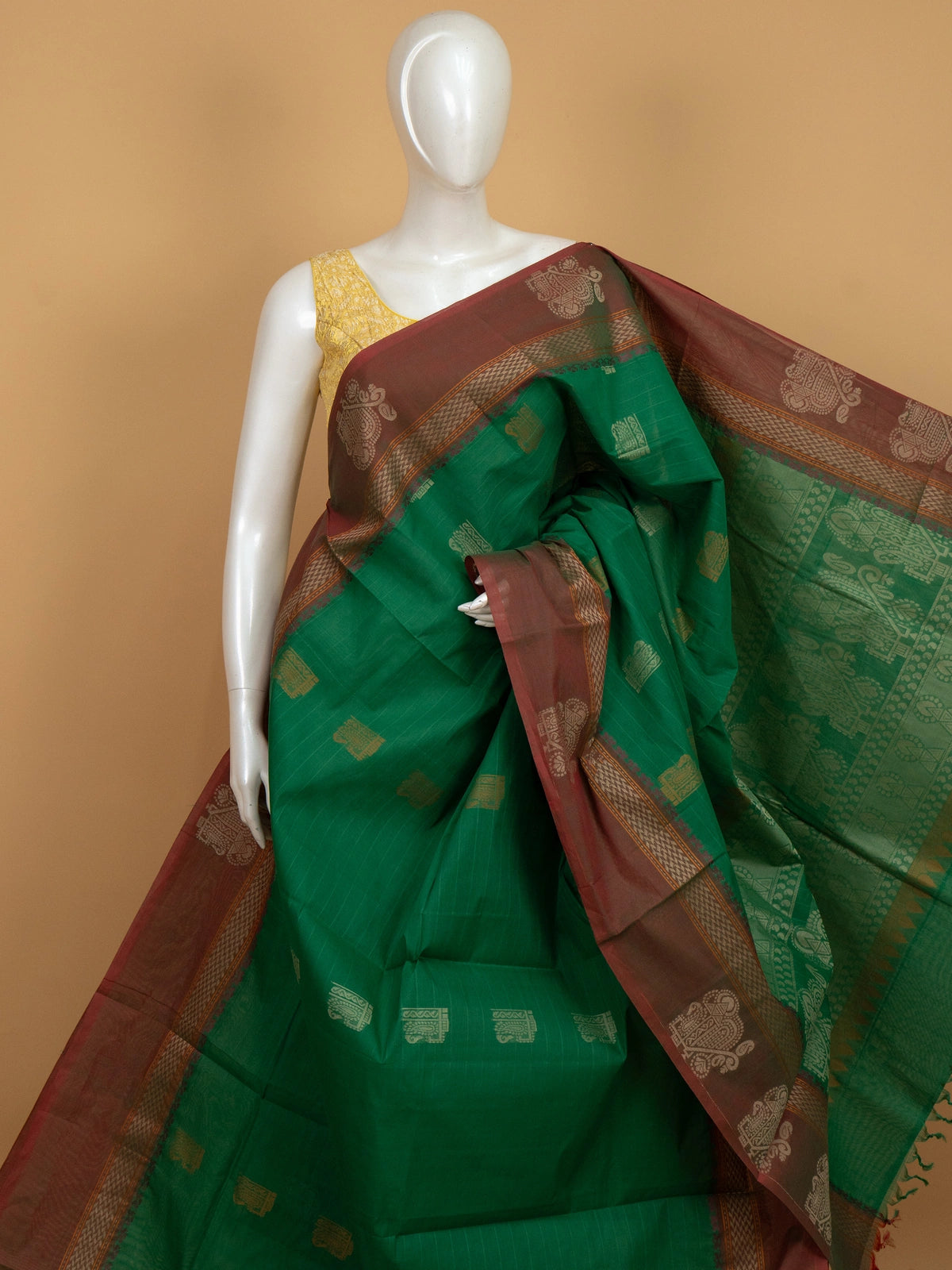 Green semi raw silk saree with contrast maroon gold zari border and woven butta motifs