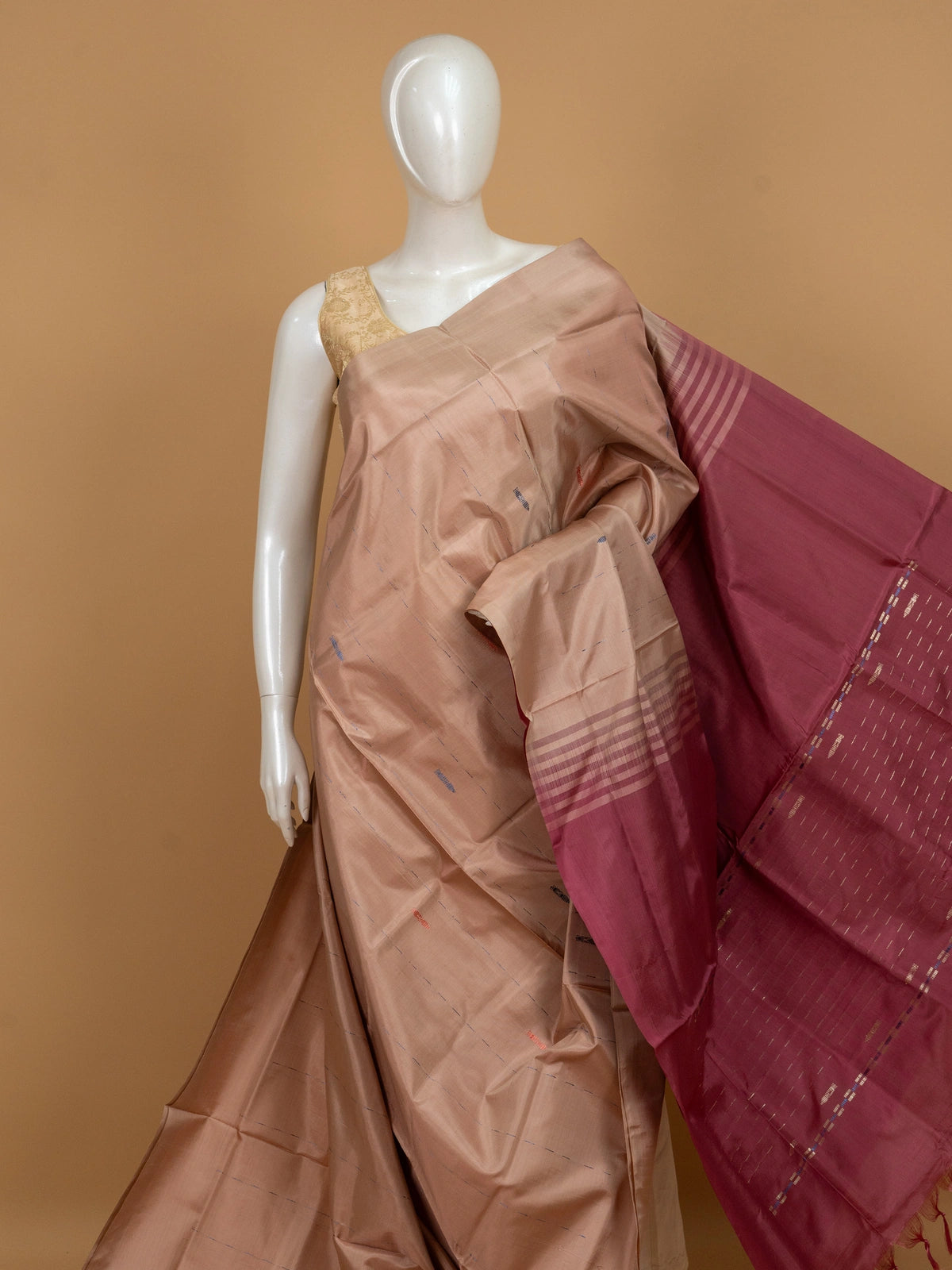 Beige banana silk saree with contrast maroon zari pallu and border