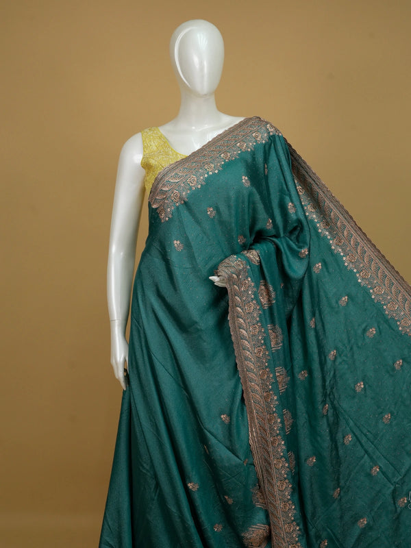 Teal green designer saree with copper floral embroidery, sequin work and scalloped embroidered border