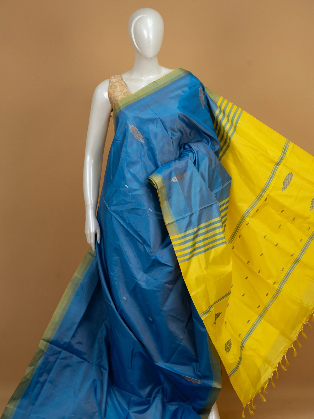 Blue Banana silk saree with yellow contrast pallu and silver zari floral buttas