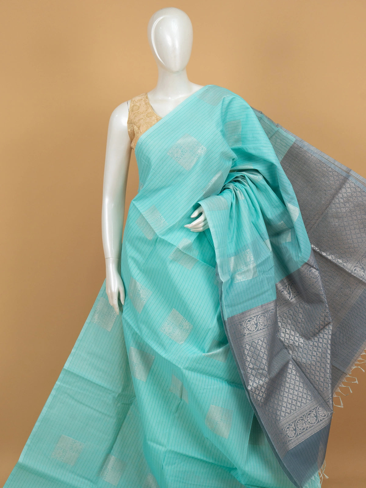 Aqua blue silk cotton saree with silver zari buttas and contrast grey-blue zari border