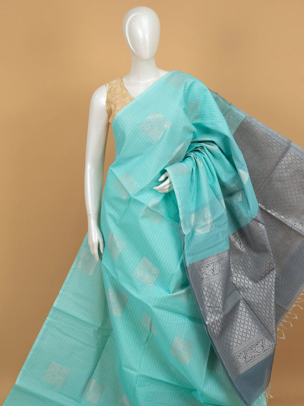 Aqua blue silk cotton saree with silver zari buttas and contrast grey-blue zari border