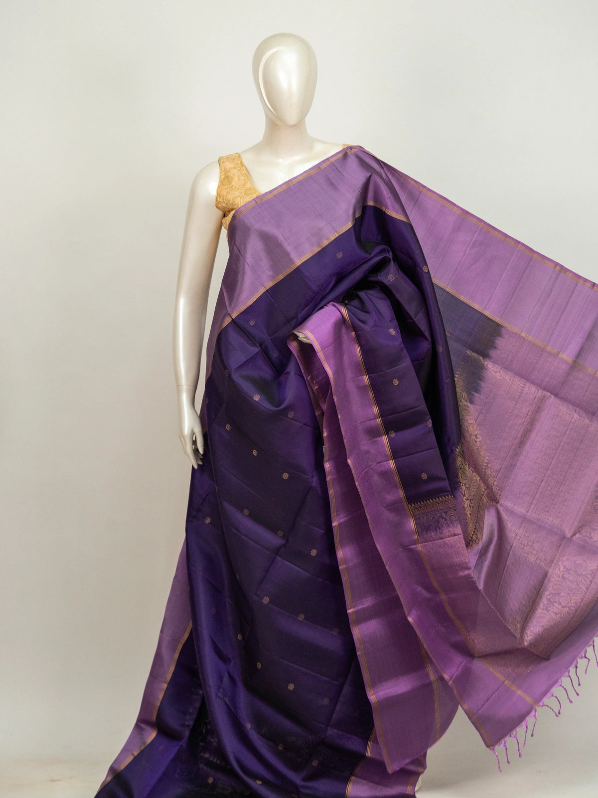 Purple and lavender pure soft silk saree with gold zari border and paisley pallu