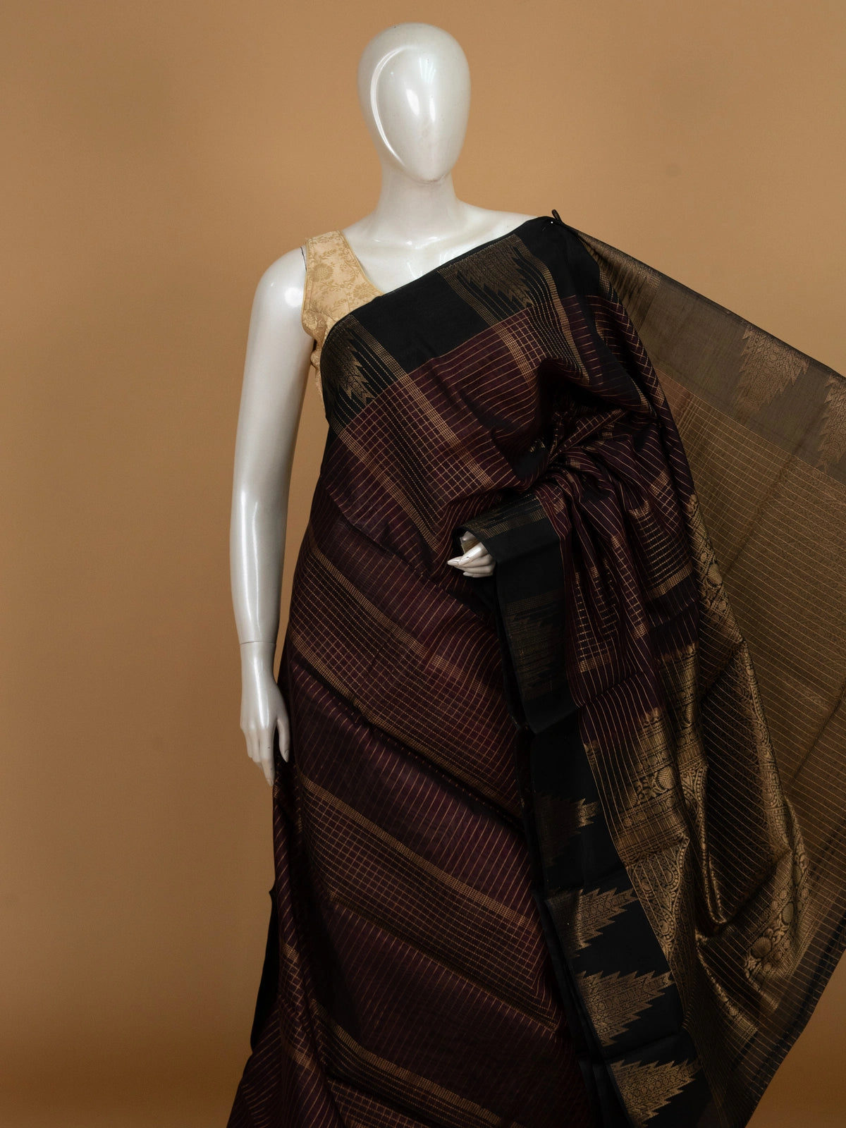 Maroon pure silk cotton saree with gold zari checks and contrast black temple border
