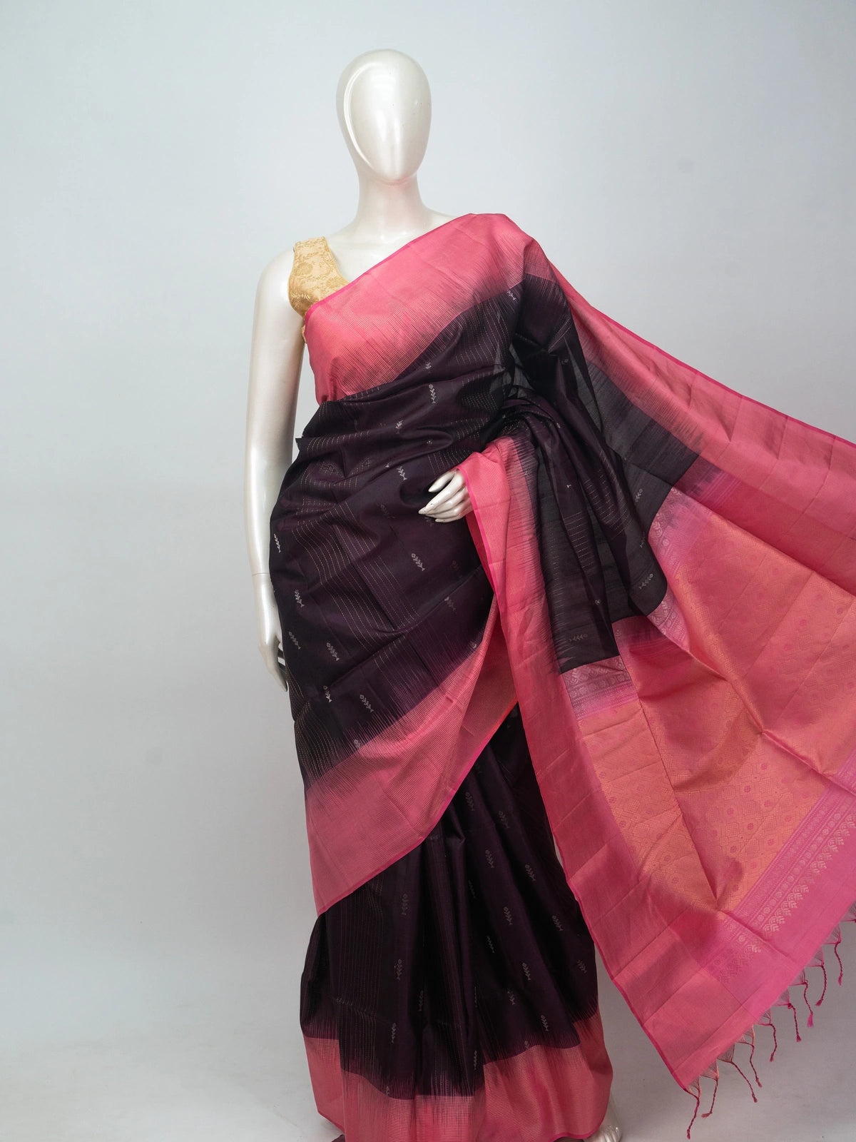 Deep wine soft silk saree with contrast pink zari border and tasselled pallu